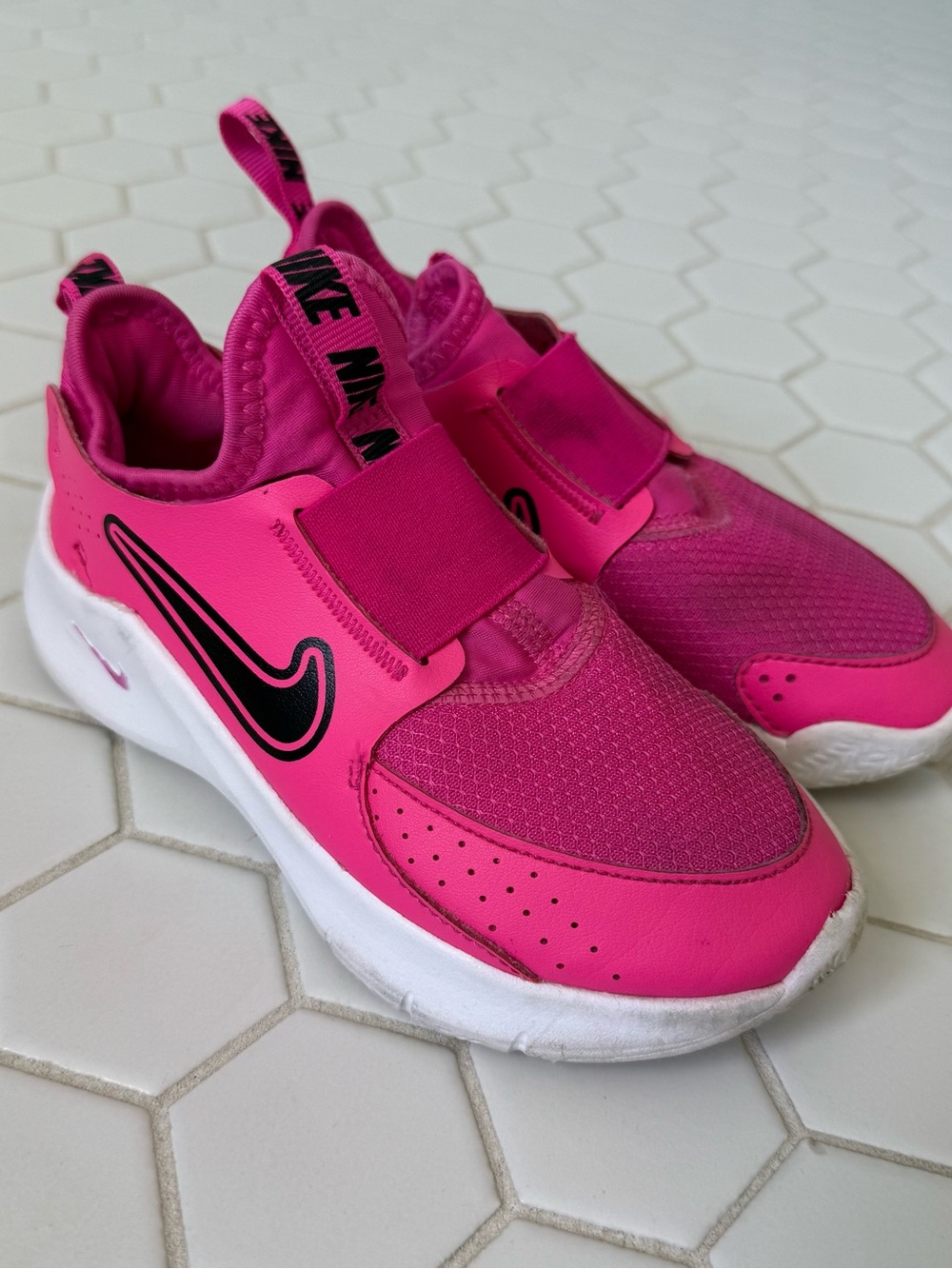 Nike Kids Bright Pink Slip-On Sneakers with Black Swoosh